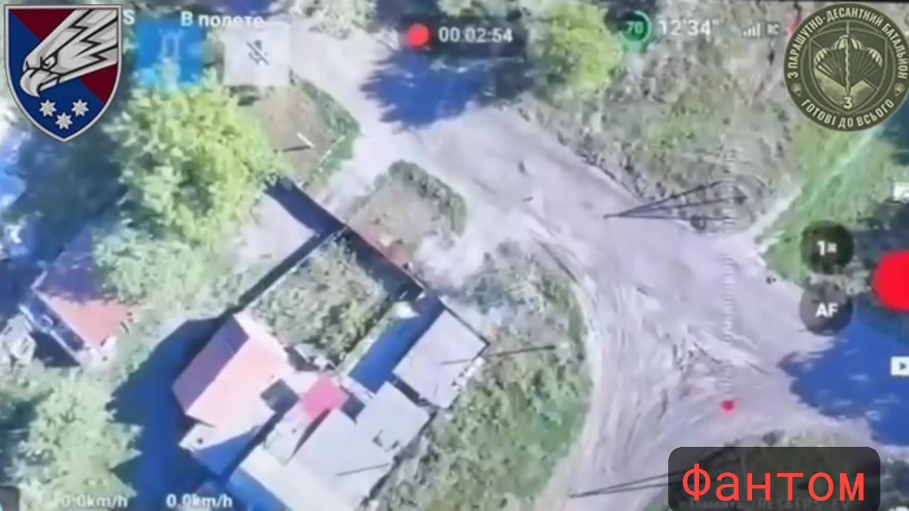 Russian Troops Hit While Taking Up Positions Around a House