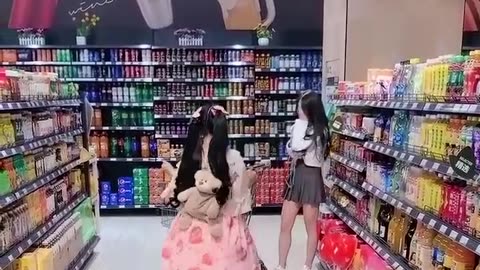 Little girl: A 58-year-old girl dances in a supermarket