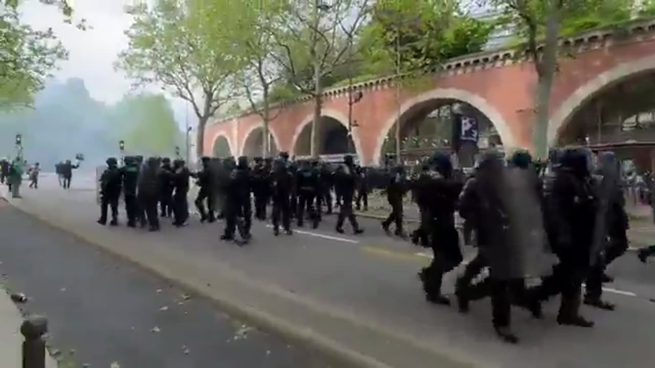 Police attack on people during protest in Paris.