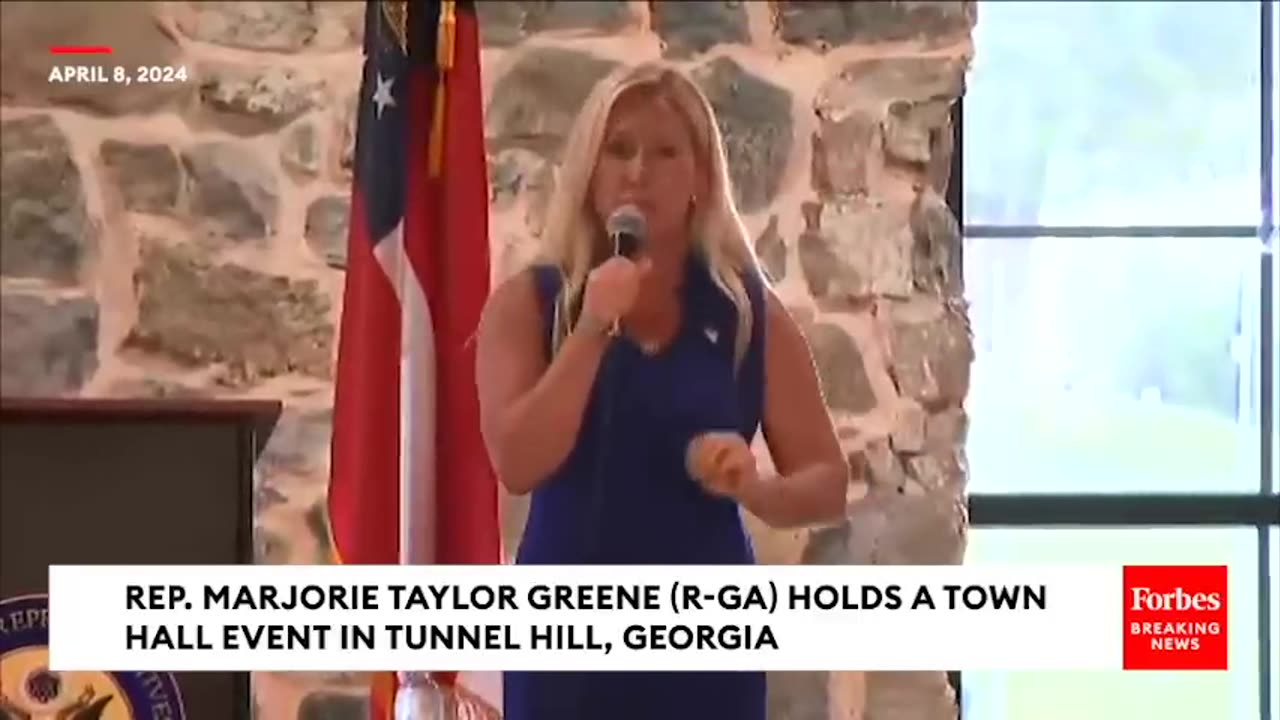 Marjorie Taylor Greene Plays Video At Town Hall To Defend Motion To Vacate Against Johnson