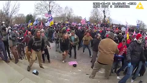 Woman pushed down lower West Plaza stairs by police inflaming crowd 2:26 p.m.