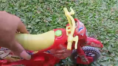 Cool red 4-wheeled dirt bike toy