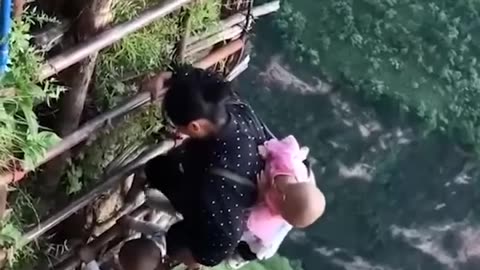 The cliff village😱 on the mountain,❗❗❗ people living here are not easy😭.
