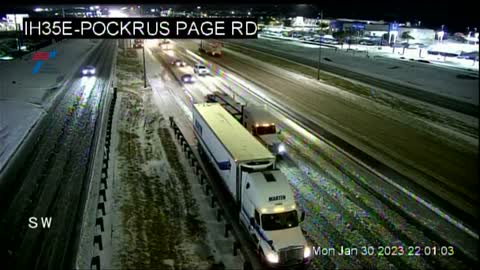 Vehicles travel carefully on Dallas roads as icy conditions continue