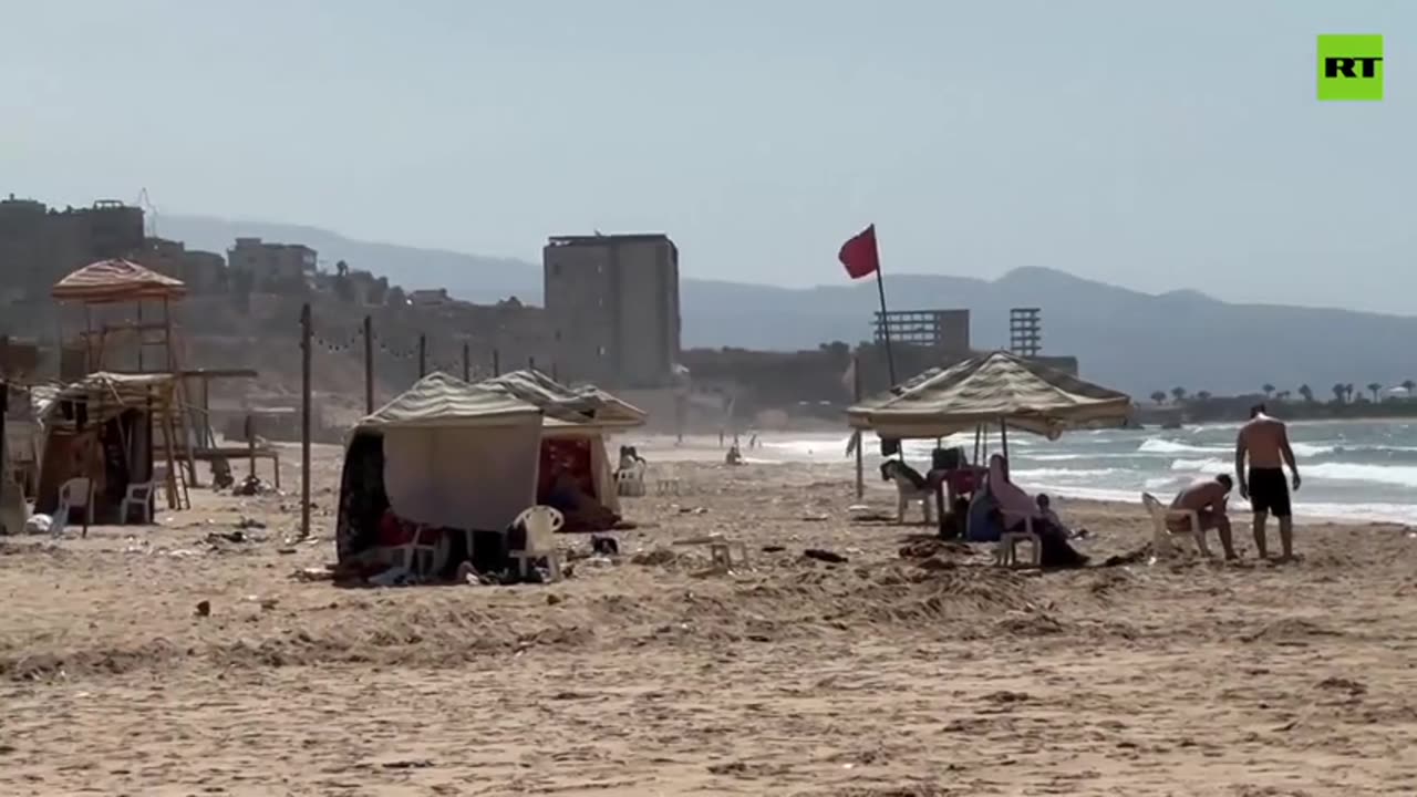 Displaced Lebanese camp on shores as shelters reach breaking point