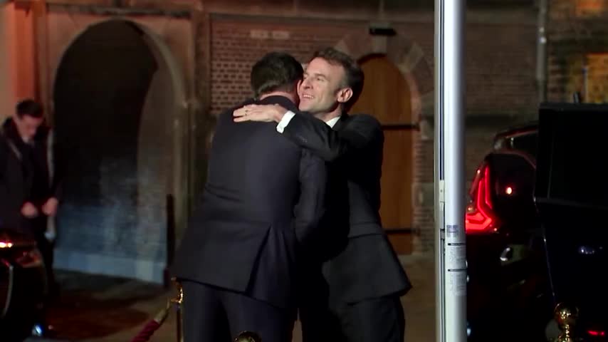Macron meets Dutch PM Rutte in The Hague Creepy touch