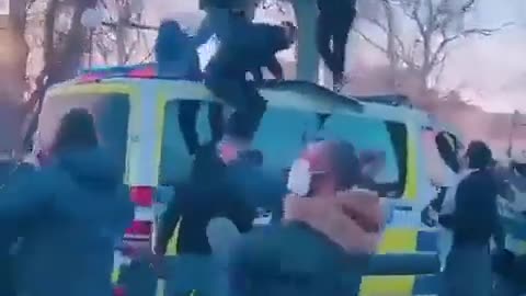 Migrants in Europe destroy police cars and shout Allah Akhbar