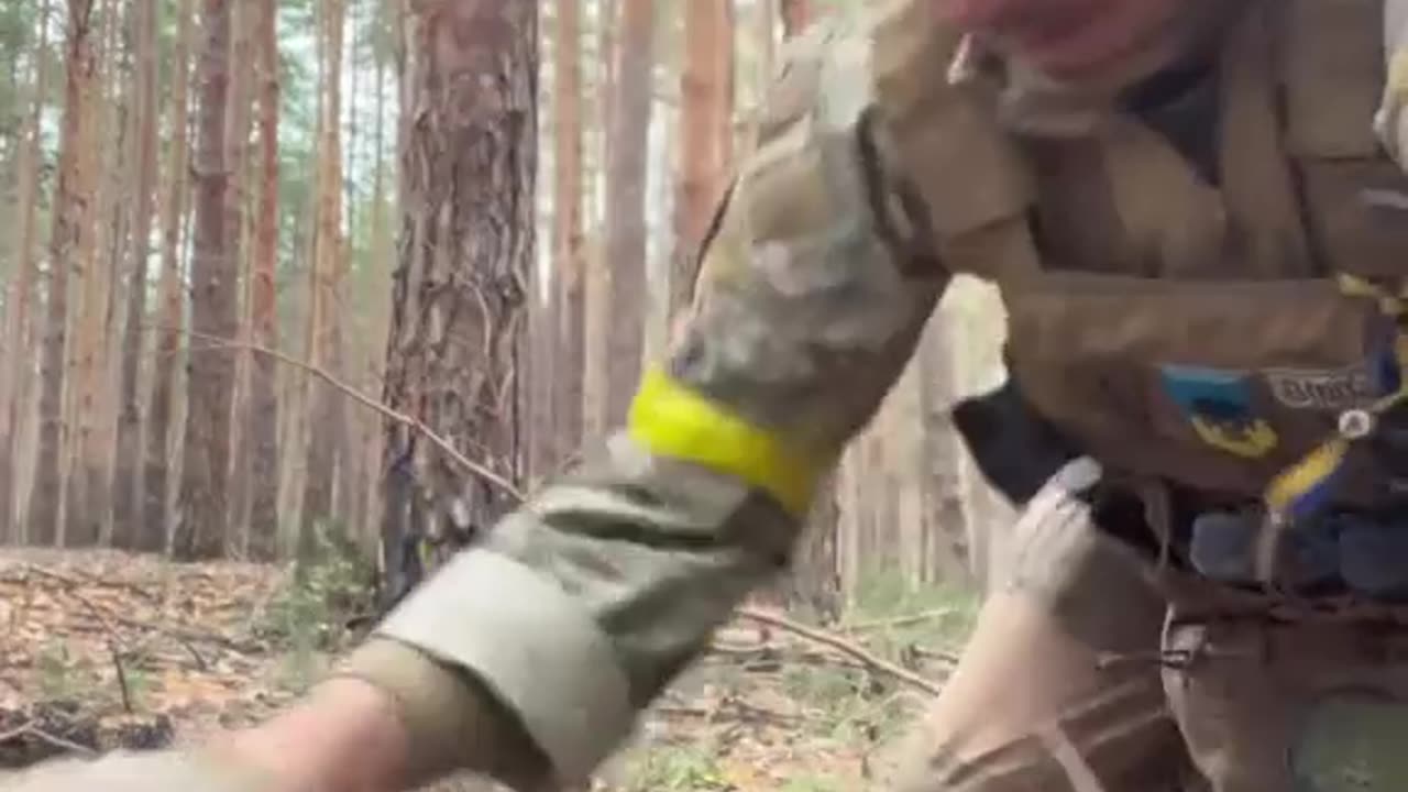 In this video, a British mercenary is buried by Russian artillery strikes