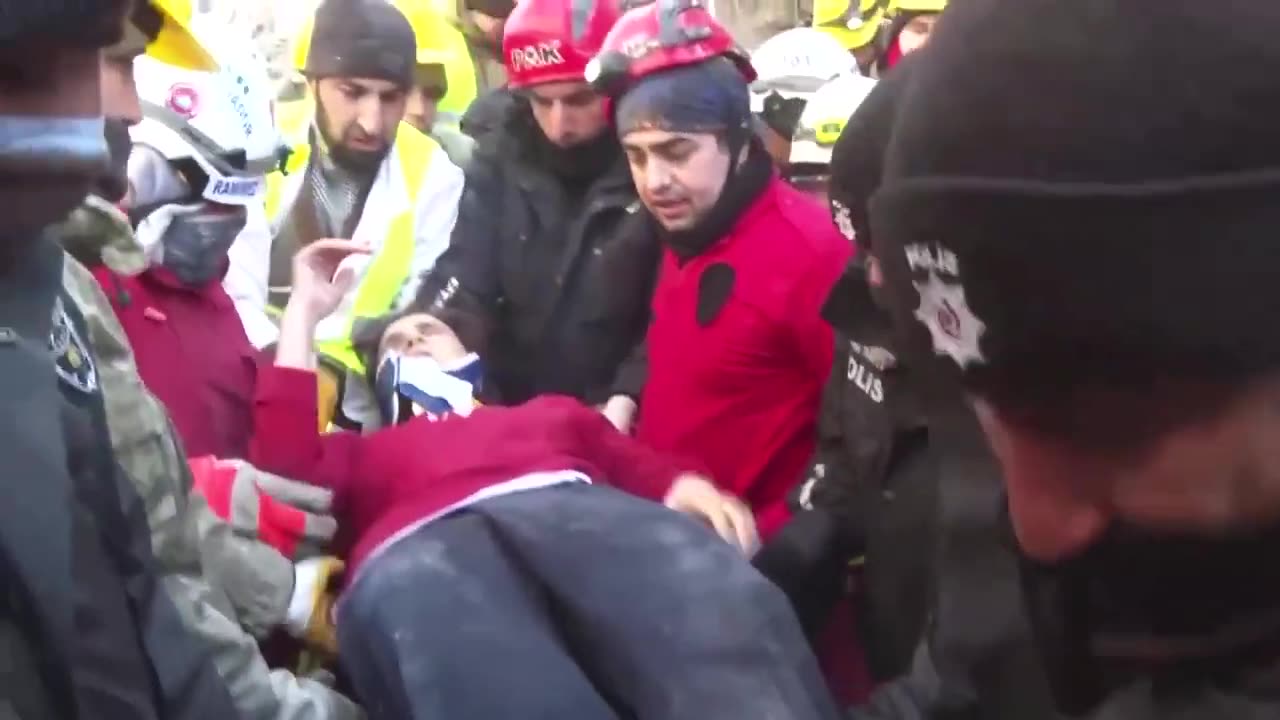 WARNING: GRAPHIC CONTENT - Woman, child pulled alive from Turkey quake wreckage