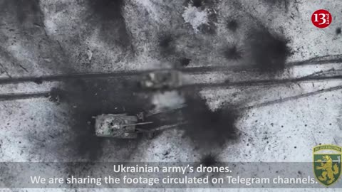 The Russians lying next to the tank were not lucky enough to rest - the drone is at work