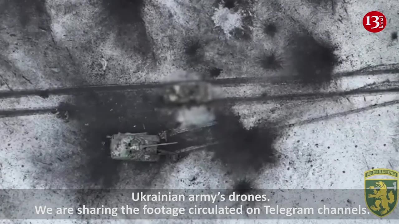 The Russians lying next to the tank were not lucky enough to rest - the drone is at work