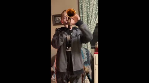 Playing with a Old Brass Bugle