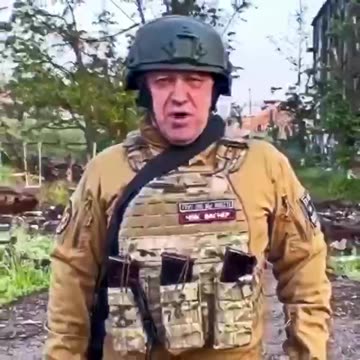 Yevgeni Prigozhin and Belarus' President Aleksander Lukashenko