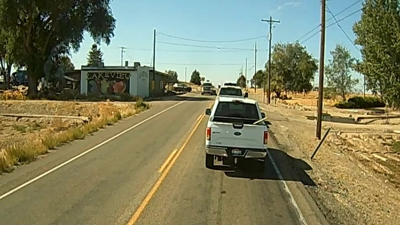 One head lighter Dumps Trash On the Road