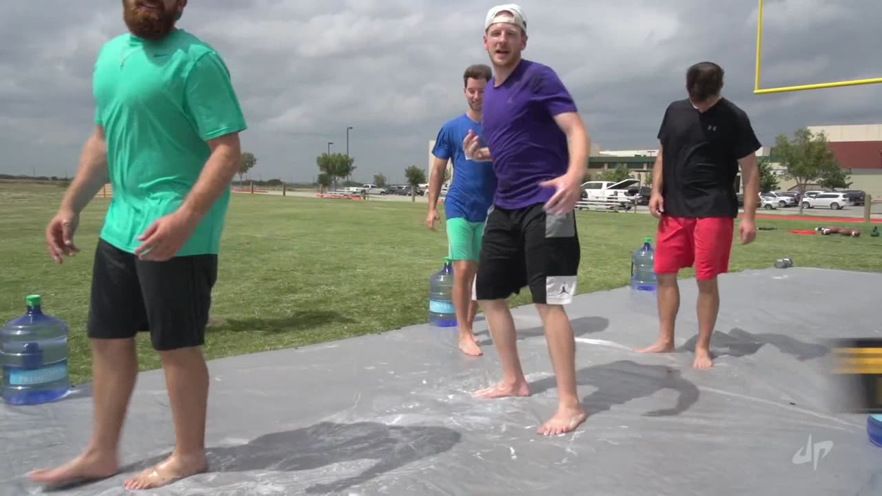 Slip and Slide Football Battle - Dude Perfect