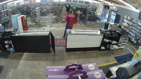 Van Drives Through Gaming Store