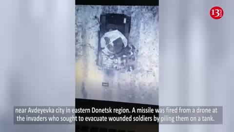 Russians seeking to carry the wounded on a tank TARGETED by drone