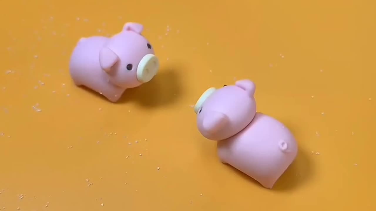 A pig tries to get out after getting stuck in candy