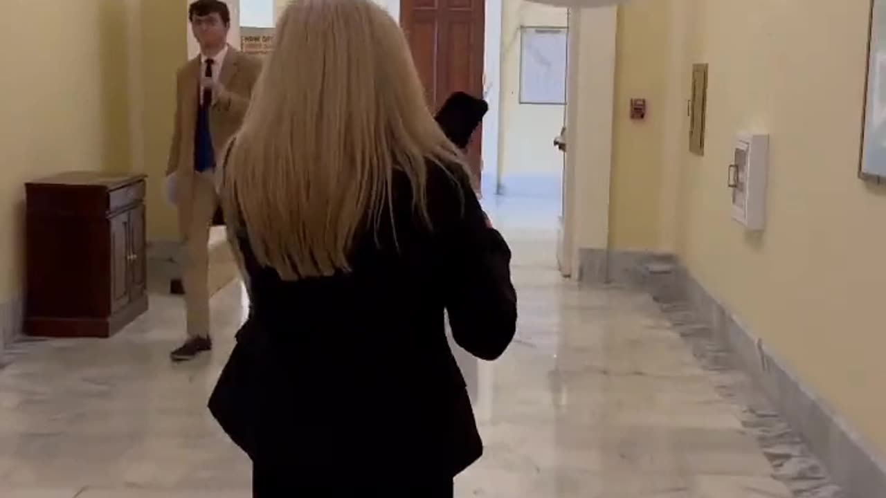 Marjorie Taylor Greene bringing a white balloon to State of the Union speech