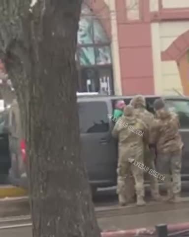 Gangs of Ukrainian recruitment officers patrol the streets