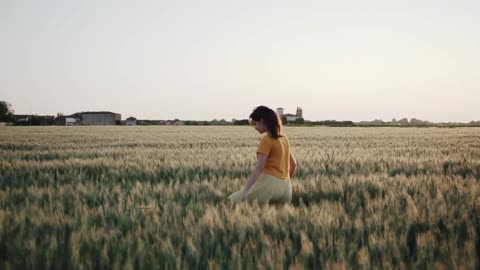 Beauty Girl Running on The Field