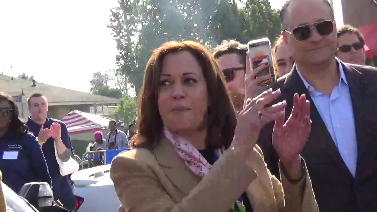 Kamala Harris screams "DOWN WITH DEPORTATION" at a far-left protest.