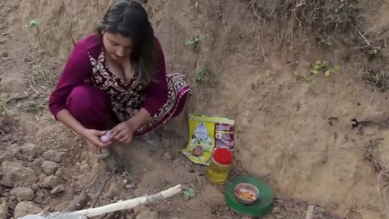 beautiful village girl cooking pork curry