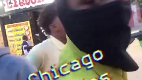 Little Black Kids Wavign Guns In Chicago