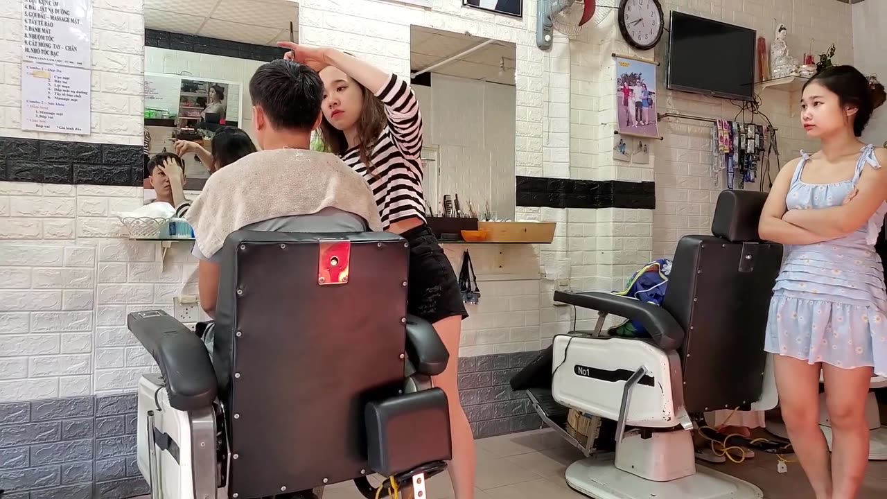 Comprehensive relaxation service for men at Vietnam barbershop with 3 beautiful girls