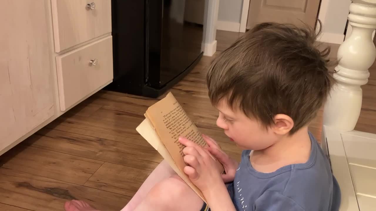 Corban Reading To Lilyanna While She Bakes Cookies - 1/30/23