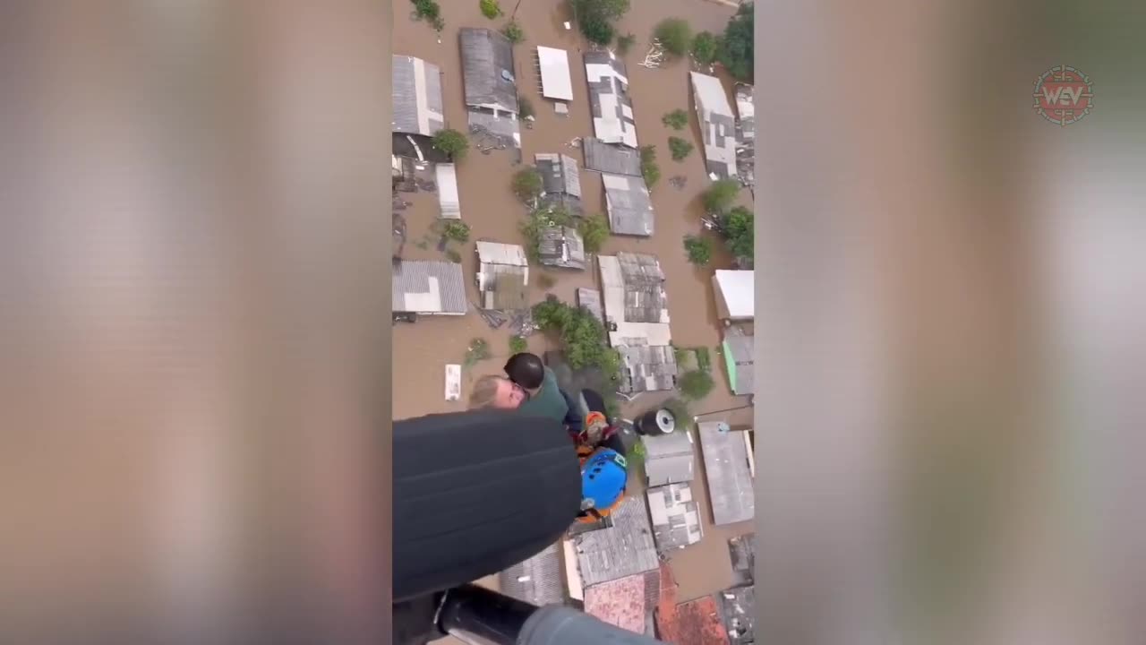 ***From Rooftops to Rescue Boats: Desperation Grows in Flood-Stricken Brazil***