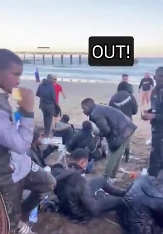 UNDOCUMENTED ASYLUM SEEKERS ARE GIVEN A NEW SMARTPHONE AS SOON AS THEY REACH BEACH IN SPAIN