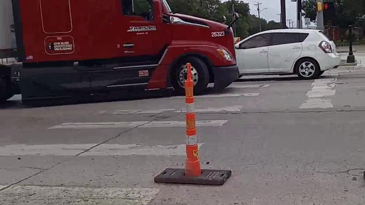 Bicycle "Corner Refuge Islands" Create Hazards For Long Trailers