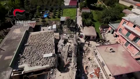 Rescuers search for survivors after building explodes in Italy