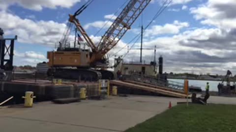 Unloading crane off barge