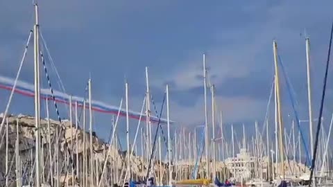 Russian jets spray the colors of Russia's flag