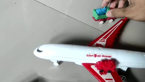 mini truck toy transporting rhino toy