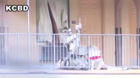 WOAH: Police Robot Takes Down Suspect In VIRAL Clip