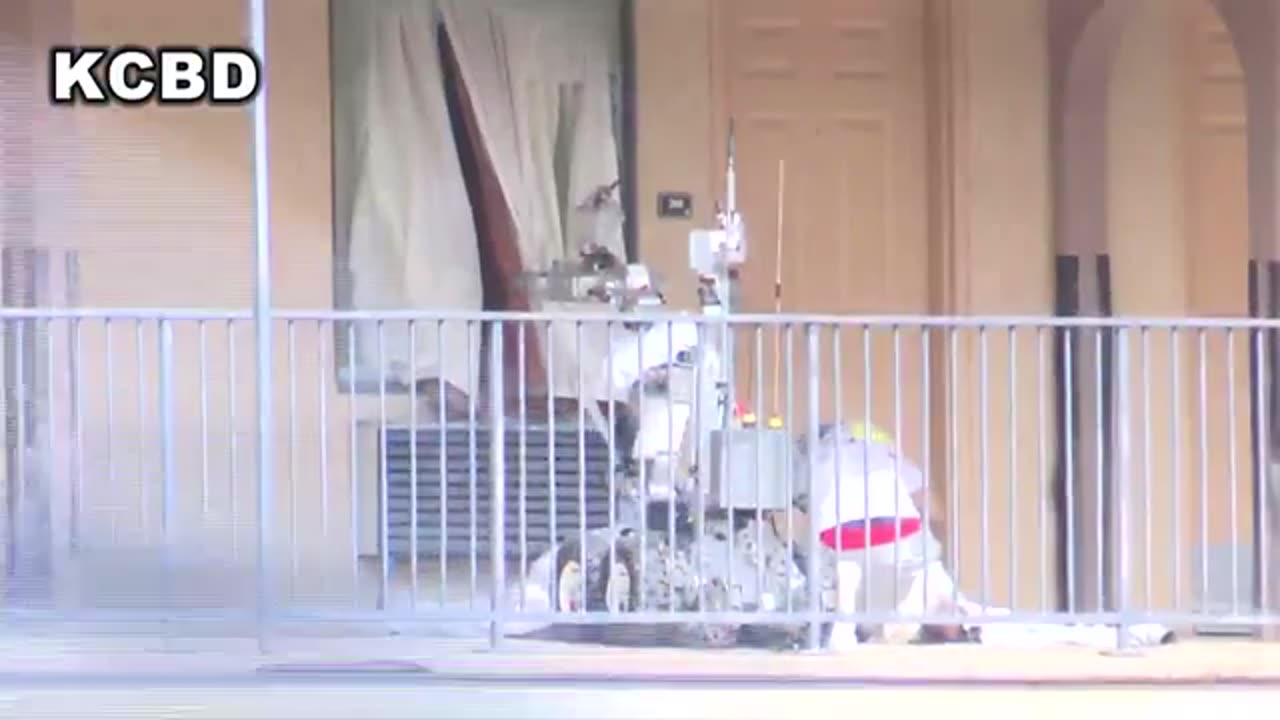 WOAH: Police Robot Takes Down Suspect In VIRAL Clip