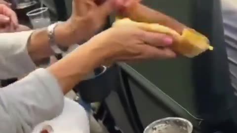 Do you know anyone who eats a hot dog like this?