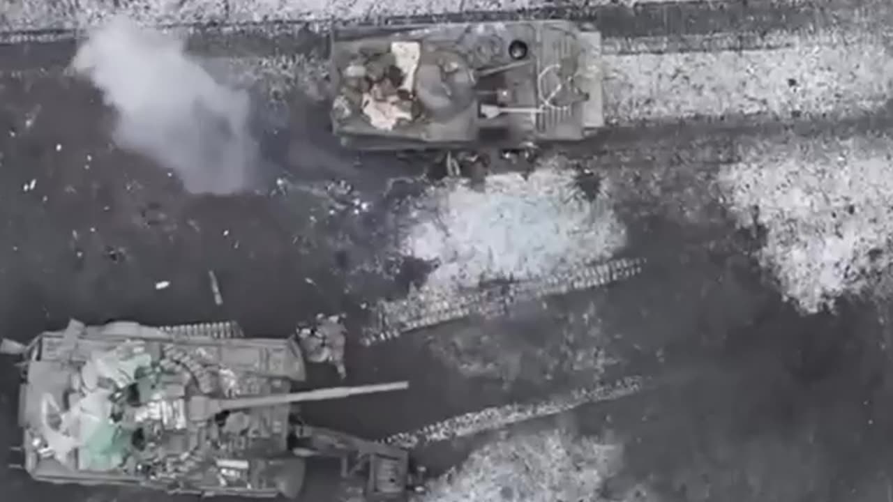 Ukrainian drones dropping explosives on Russian soldiers.