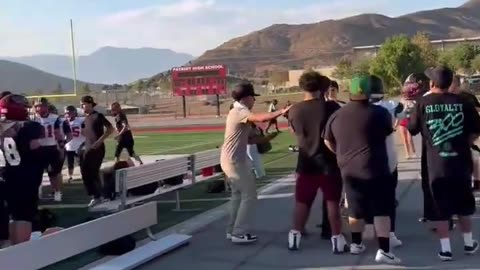 A brawl breaks out after a JV football game in Jurupa Valley, California.