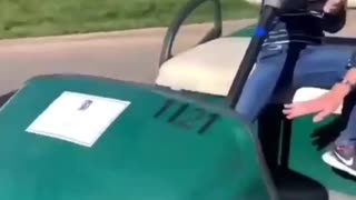 Kid driving a golf cart. What could possibly go wrong?