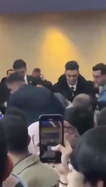 Protesters interrupted Erdogan's speech with shouts of "Our ships are carrying bombs for Israel."