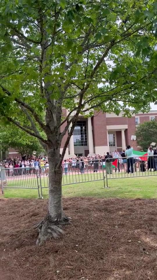 Fraternity brothers DROWN OUT pro-Palestine protesters with national anthem