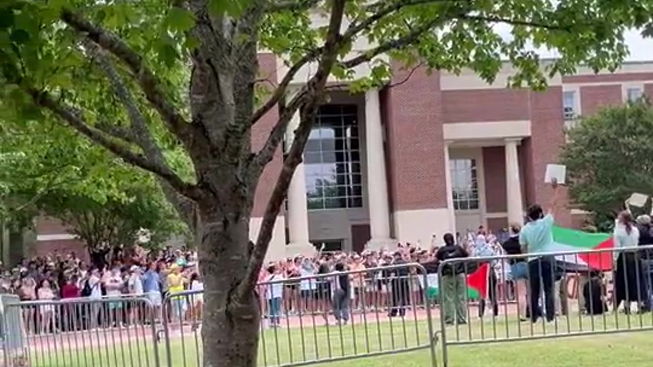 Fraternity brothers DROWN OUT pro-Palestine protesters with national anthem