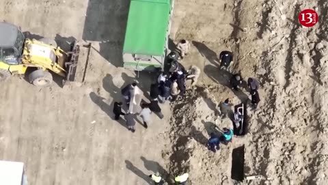 Drone footage shows hundreds of quake victims buried in mass graves