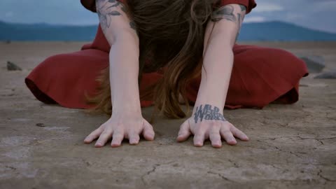 doing yoga in the middle of a desert