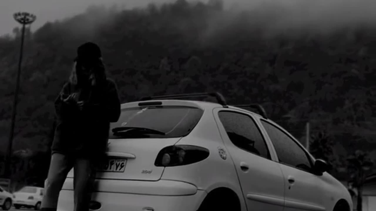 "Iranian Girl with a Beautiful White Peugeot 206"