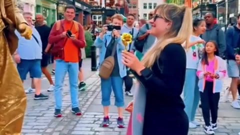 Watch: Street Artist Surprises Lady While Performing Statue Art! 🗿💫